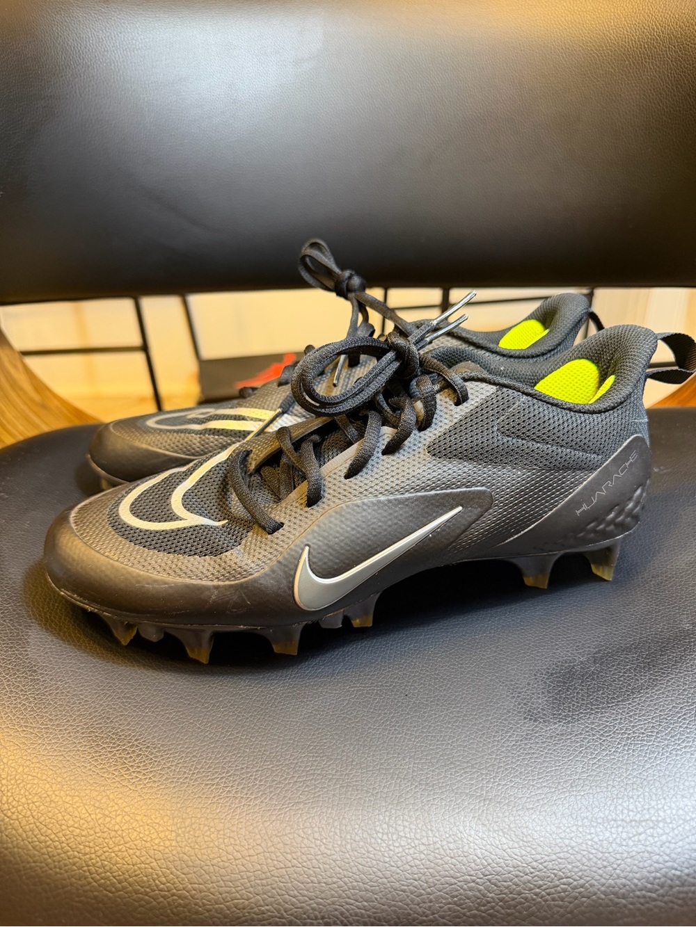 Nike Kids Black Soccer Cleats with Neon Yellow Lining